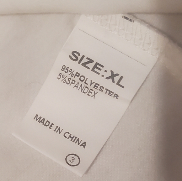 White tunic blouse. Size XL. Made of 95% polyester & 5% spandex. - Picture 9 of 9